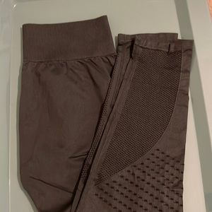 Fabletics army green seamless leggings with detailing. Size medium
